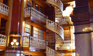 Interior of the Law Library from the bottom floor showing one of the wrought iron spiral staircases.